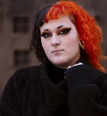 Trans feminine individual expressing authentic self